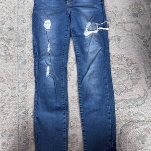 Women’s Distressed Blue Skinny Jeans